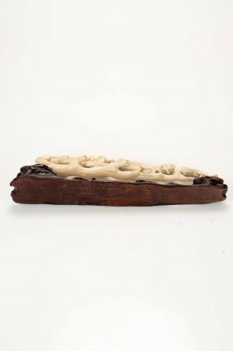 An Ivory Okimono Depicting A Lively Family Of Monkeys On A Long Branch - 