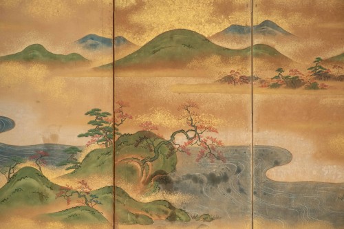 Asian Works of Art  - A folding screen depicting a hilly landscape with a watercourse