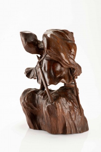 A Boxwood Okimono Depicting Shoki Attempting To Surprise An Oni - 