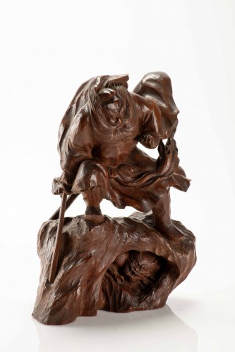  - A Boxwood Okimono Depicting Shoki Attempting To Surprise An Oni
