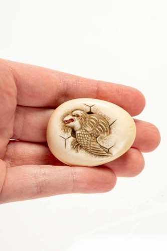 An Egg-shaped Manju Netsuke Featuring A Tengu - 