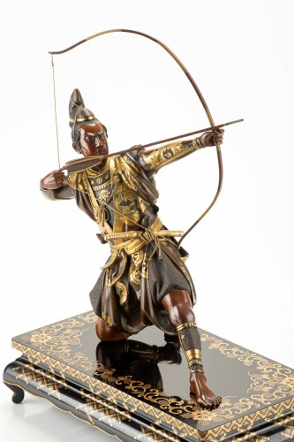 Asian Works of Art  - A bronze okimono depicting a samurai with a bow, signed Yoshimitsu