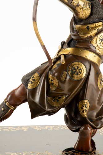 A bronze okimono depicting a samurai with a bow, signed Yoshimitsu - 