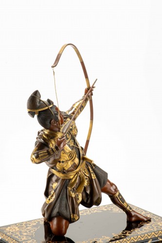 Antiquités - A bronze okimono depicting a samurai with a bow, signed Yoshimitsu