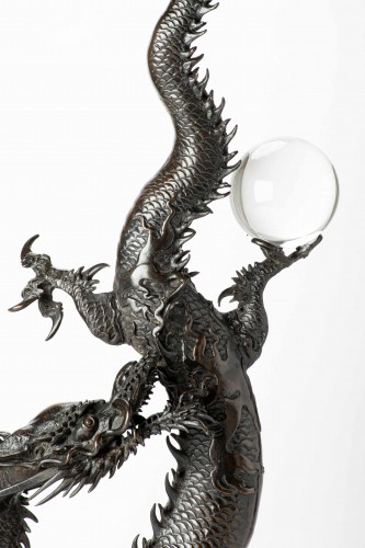 Asian Works of Art  - A Large Bronze Okimono Depicting A Dragon