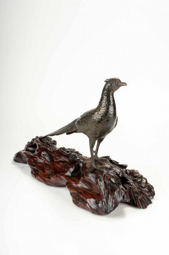 Antiquités - A japanese gilt and patinated bronze okimono of a pheasant