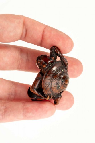 19th century - A boxwood netsuke depicting an Oni and the Setsubun festival