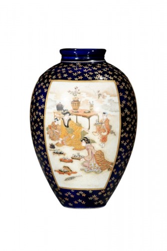 A Satsuma vase with courtly scenes on a cobalt-blue ground