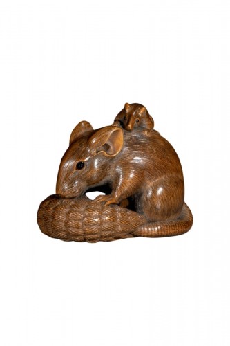 A boxwood okimono with two mice and a millet ear, signed Ikko