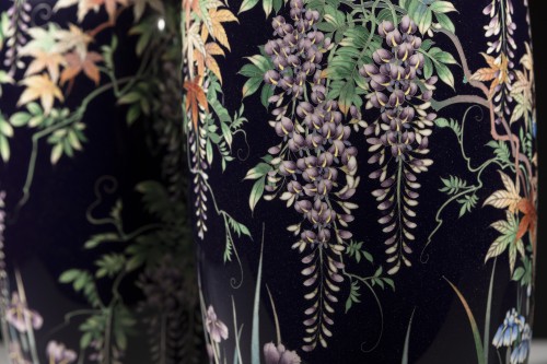Asian Works of Art  - A pair of cloisonné vases depicting a flower garden