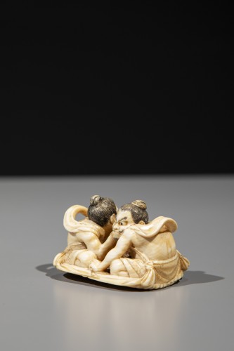 An ivory netsuke depicting Raijin and Fujin on a sandal - Asian Works of Art Style 