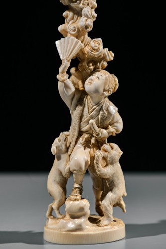 An ivory okimono of Kintaro with a phoenix, signed Kazutoshi - 