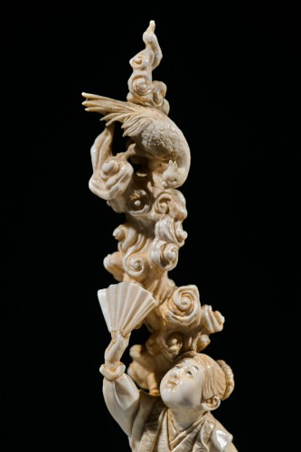 19th century - An ivory okimono of Kintaro with a phoenix, signed Kazutoshi