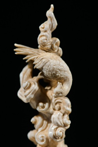 An ivory okimono of Kintaro with a phoenix, signed Kazutoshi - 