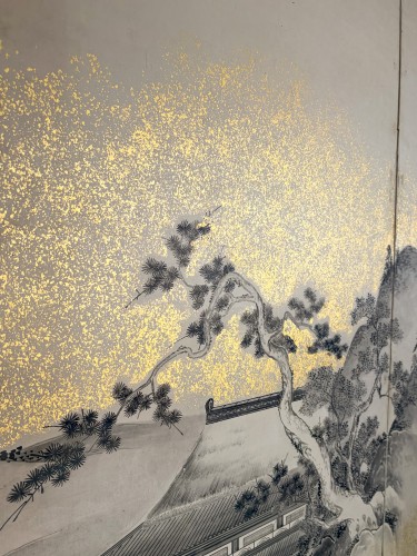  - A six-panel folding screen with a lakeside landscape in ink and gold powder