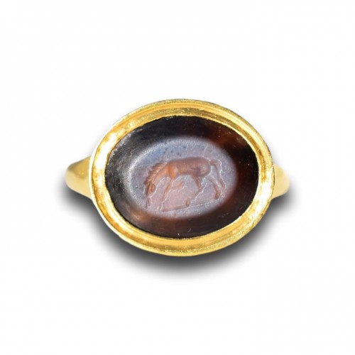 Antique Jewellery  - Ancient Nicolo intaglio of a grazing horse. Roman, 1st - 2nd century AD.