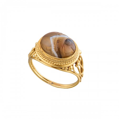 Etruscan revival gold ring set with an agate scarab