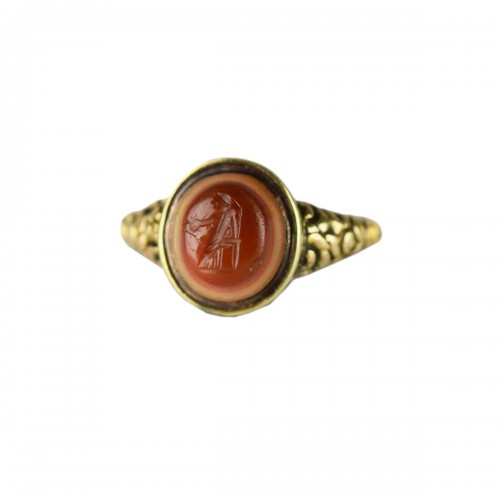 Georgian gold ring set with an ancient intaglio. English, 19th century