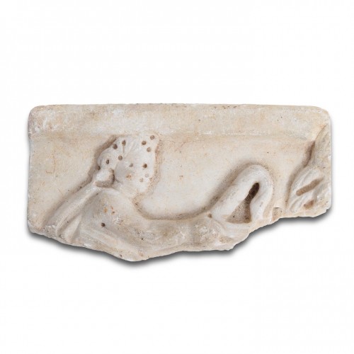 Marble sarcophagus fragment with the head of Eros. Roman, 2nd - 3rd century - 