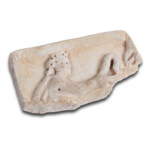 BC to 10th century - Marble sarcophagus fragment with the head of Eros. Roman, 2nd - 3rd century
