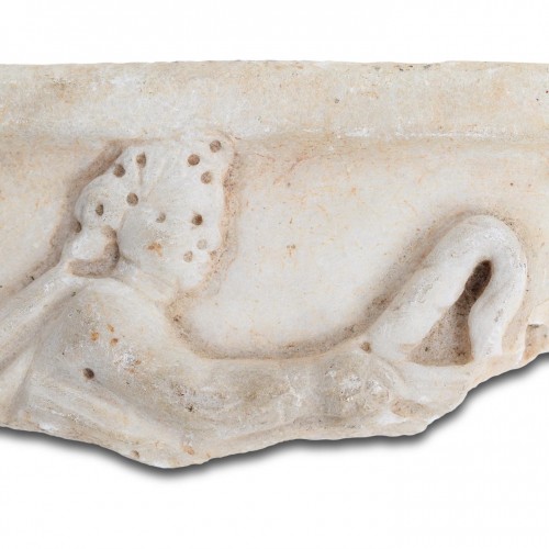 Marble sarcophagus fragment with the head of Eros. Roman, 2nd - 3rd century - 