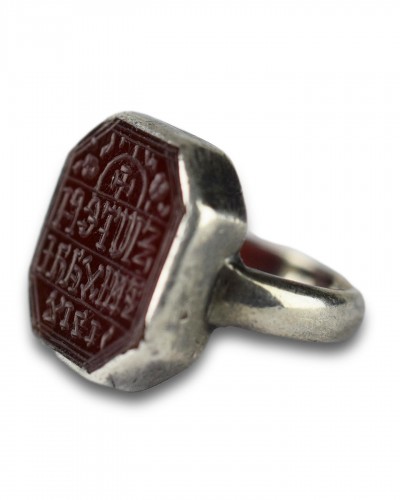  - Silver mounted carnelian intaglio ring. Eastern Orthodox, dated c.1716