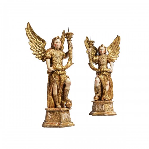 Pair of gilded wooden torcheres of Angels, Northern Italy 17th century