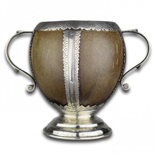  - A silver mounted coconut cup. English, mid 18th century.