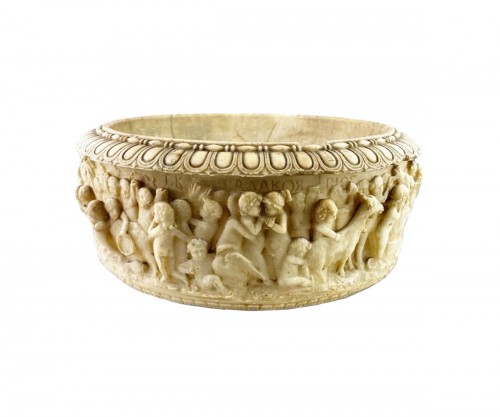 Grand tour alabaster font carved with frolicking putti, Italy 9th century