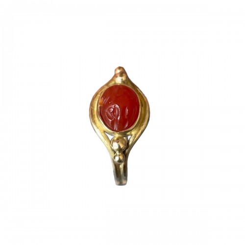 High gold ring set with an Ancient carnelian cameo of Eros