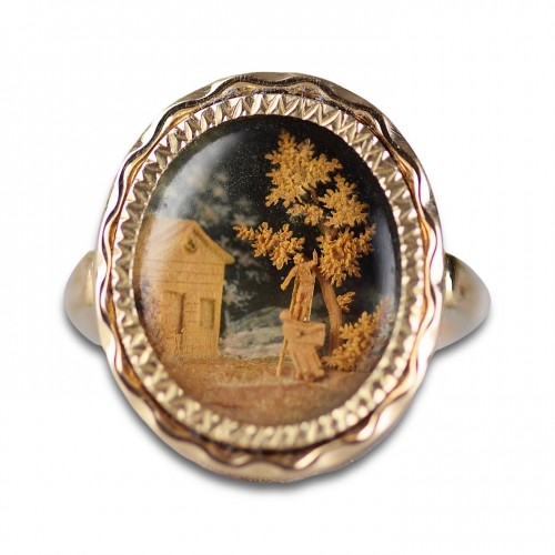  - Gold ring set with a micro-wood carving. French, 18th century.