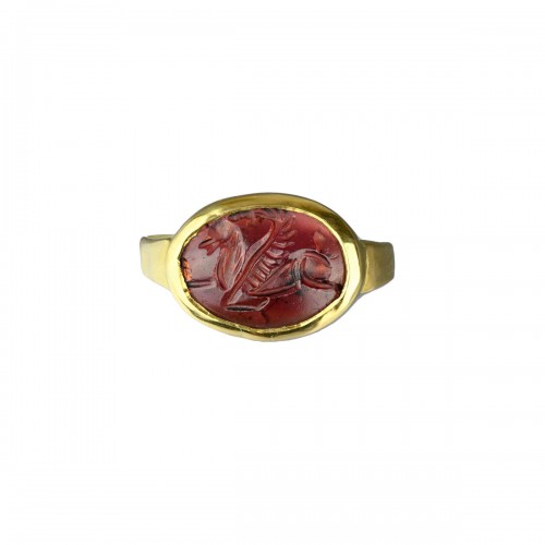 Gold ring with a garnet intaglio of Pegasus