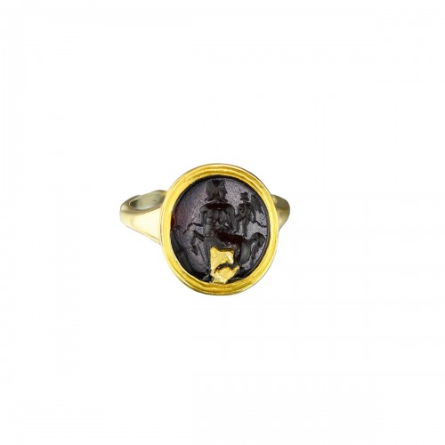 Gold ring with a sard intaglio of Cupid and a Centaur