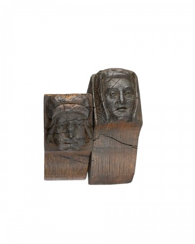Pair of oak corbels of a man and a woman