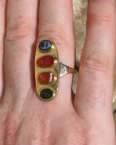  - Gold ring set with four Ancient and Renaissance hardstone intaglios