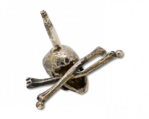 Curiosities  - Finely modelled silver skull and crossed bones
