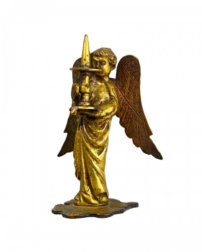 Medieval gilt bronze of a torchere bearing angel