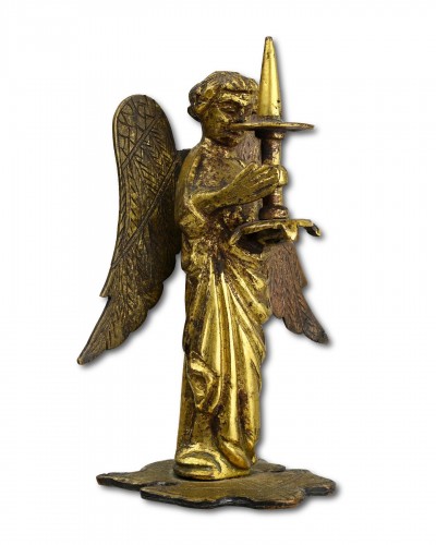 Antiquités - Medieval gilt bronze of a torchere bearing angel