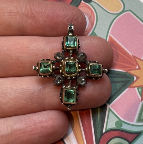  - Gold and silver cross set with table cut emeralds and diamonds