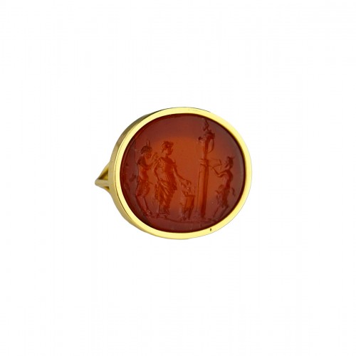 Carnelian intaglio of a Bacchanalian sacrifice set into a gold ring.