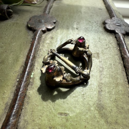Medieval silver brooch with garnets - 
