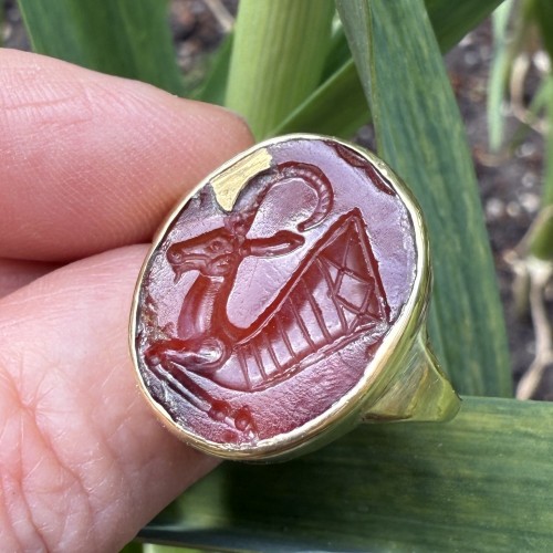 Gold Ring with an Intaglio of a Goat-Headed Rhyton. - 
