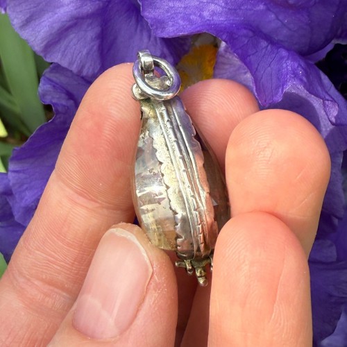 17th century - Talismanic Rock Crystal and Silver Crabs’ Eye Pendant