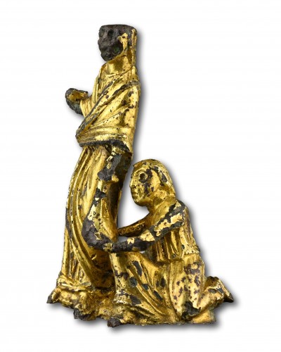 Curiosities  - Gilt-Bronze Group Depicting an Act of Almsgiving. England, early 12th centu