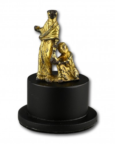 Gilt-Bronze Group Depicting an Act of Almsgiving. England, early 12th centu - 