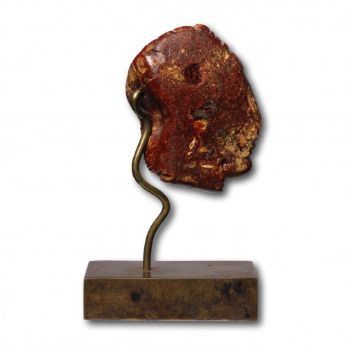 Ancient Art  - An Etruscan Amber Head Pendant - Etruria circa 5th century B.C. 