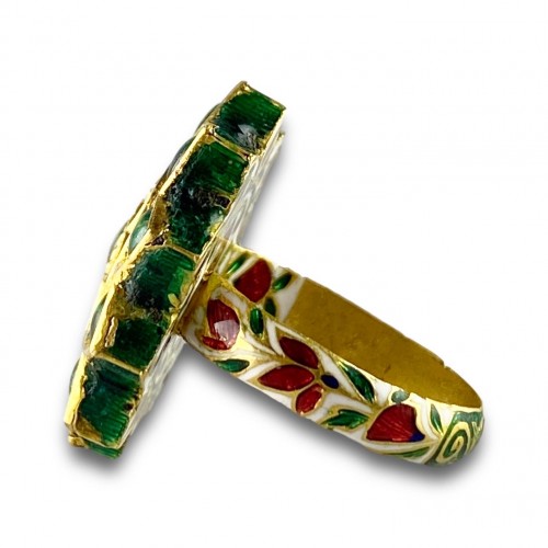 20th century - A foiled emerald, paste &amp; enamel ring. Indian, early 20th century.