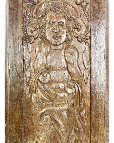 A large oak relief of a grotesque figure, France dated 1660 - 