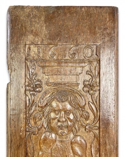 17th century - A large oak relief of a grotesque figure, France dated 1660