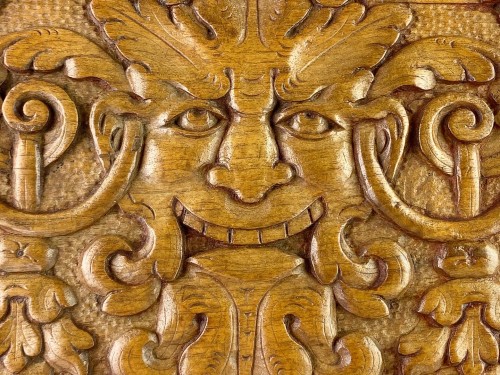 Architectural & Garden  - Pair of walnut panels carved with mascarons. French, late 16th century.